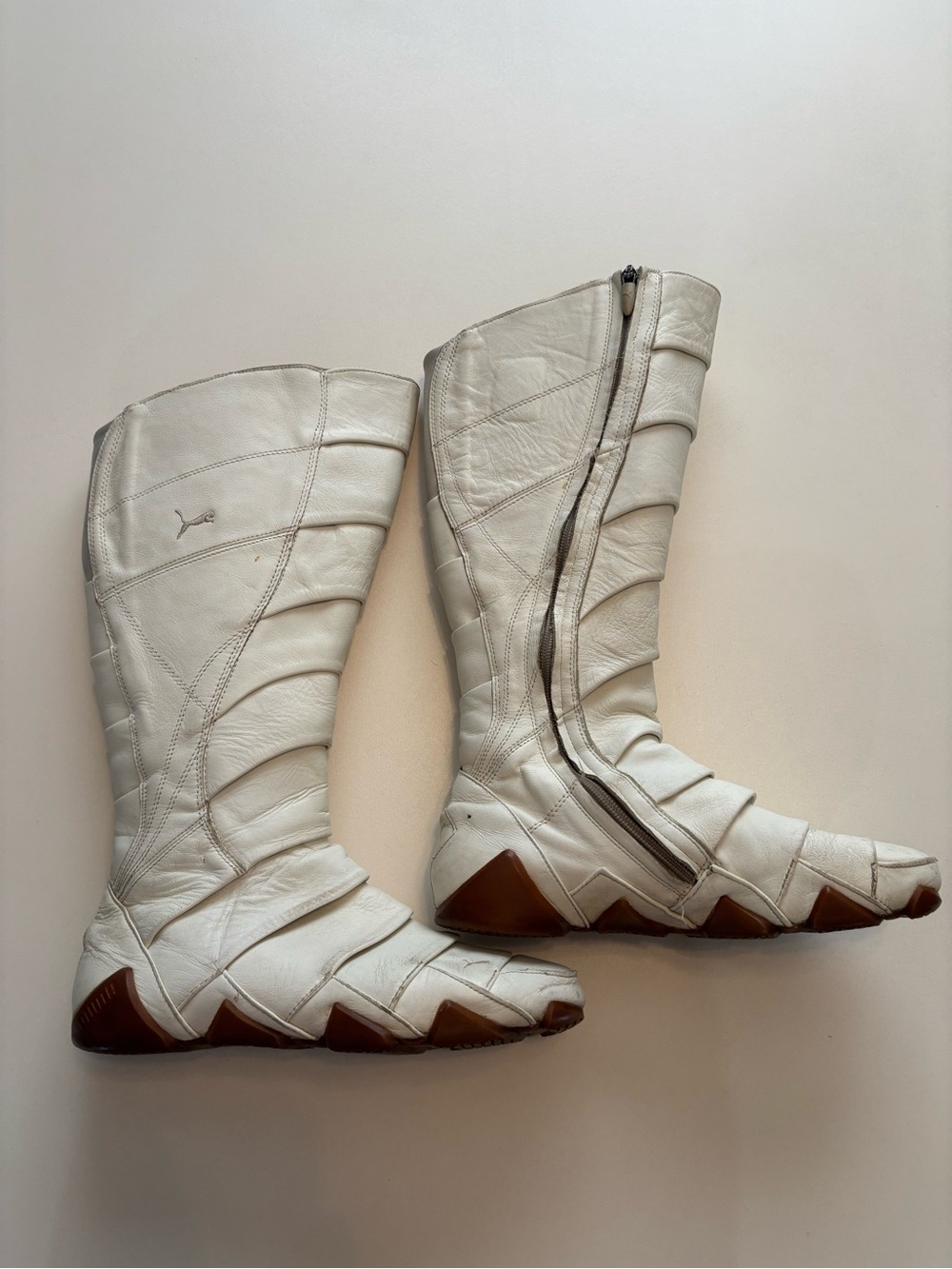 Puma White Knee-High Leather Heeled Boots with Brown Soles